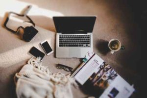 How To Earn Money Online - laptop on floor